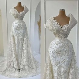 Abiti da sposa sirenetta da sposa splendida abito in pizzo applique perle perle overskirt treno di spiaggia su misura per la spiaggia di spiaggia per alte plus size vestido de nolia