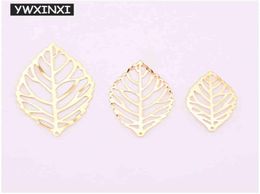 YWXINXI 50Pcs fashion simple leaf filigree metal handicraft jewelry DIY handmade jewelry pendant costume decoration8631811