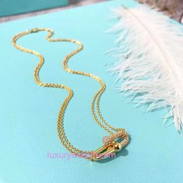 Luxury Tiifeniy Designer Collane a sospensione a basso prezzo di gioielli coreani a basso prezzo con folle di femmina a bottone da donna in oro 18k e rame inciso