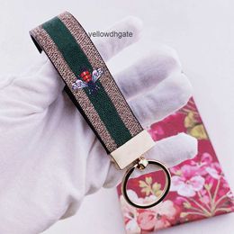 Keychains Lanyards Designer Keychain Key Chain Buckle Keychains Lovers Handmade Leather Brand Colourful Flowers Bee Snake Bag Pendant Fashion Accessories