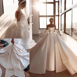 Royal Ivory Satin Dubai Arabic Wedding Dresses Sexy Beads Strapless Backless Ruched Long Train Bridal Gowns With Big Bow Robes BC14905