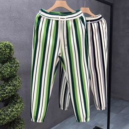 Spring/Summer mens clothing Handsome Striped Trendy Casual Men's Pi Shuai Show High Elastic Tie Feet Guard Pants jog drawstring slim