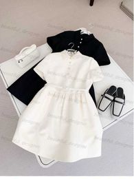 Designer women's casual dress 24 Summer French style small fragrant style dress local style small black dress high-end feeling temperament white medium length skirt