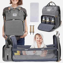 Diaper Bags Folding baby crib with replacement pad diaper bag childrens mummy backpack USB interface baby care newborn diaper cart organizerL240502
