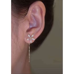 Korean version light crystal hanging temperament niche high-end feeling small flower clip without ear hole earrings