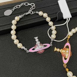 Designer Westwood temperament pink Saturn pearl bracelet womens light luxury niche exquisite full diamond high version