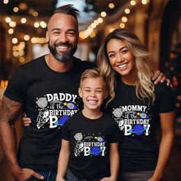 Men's T-Shirts 2024 Funny Matching Family Clothing Space Themed Birthday Boy Party T-shirt Spaceman Graphic Tops Summer Unisex Child Black Ts T240506