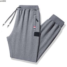 Pantaloni sportivi di tendenza primavera autunno da uomo cotone gamba sciolta casual gamba dritta più taglia a piede piede macinato