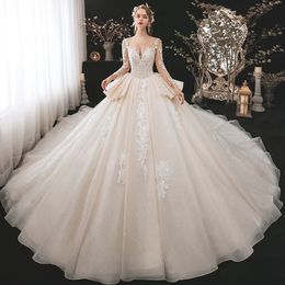 Elegant Ruffled skirt Full Sleeves Scoop Neck Ball Gown Wedding Dress Shiny Tulle Beading Appliques Lace chapel Train Handmade Bridal Gowns can Customise