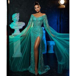 Green Mermaid Prom Dresses Long Sleeves V Neck Capes Appliques Sequins Floor Length Celebrity Lace Hollow Side Slit Evening Dress Bridal Gowns Plus Size Custom 0431