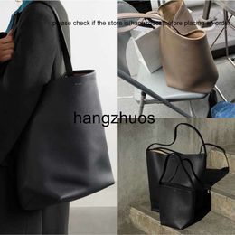 The Row Head Layer Cowhide Women's Tote Bag with Litchi Pattern Junior High Grade Large Capacity Commuting One Bucket Bag H5J2 the row bag