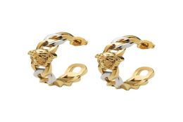 (High-quality) Retro Beauty Head Half Circle C-shaped Gold and Silver Contrast Earrings Advanced designer Earrings.7243016