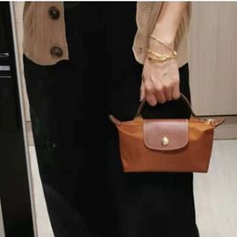 Best Selling Handbag Novel 80% Factory Wholesale Single Handle Mini Handbag Nylon Dumpling Bag Zero Wallet Small Short Shoulder Crossbody Female Bag