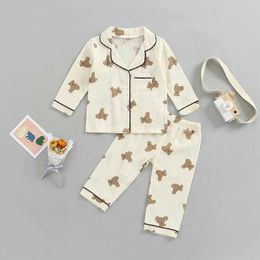 Pajamas Childrens unisex casual pajama set with cartoon bear print long sleeved front pocket lapel top+printed pants for 1-6 yearsL2405