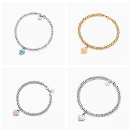 Letters T925 Sterling silver heart drop glue enamel diamond plated Buddha bead bracelet classic fashion hand accessories