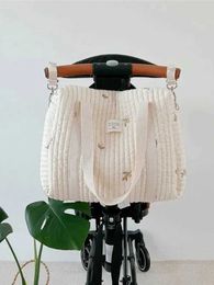 Diaper Bags Korean style newborn care diaper bag mummy shoulder bag embroidered bedding cart diaper storage Organiser handbagL240502