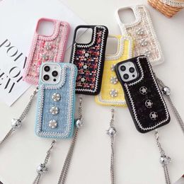 Autumn and winter plush cloth camellia suitable for iPhone 14, iphone 15 promax phone case, 13 diagonal cross chain