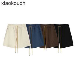 Rhude High end designer shorts for Embroidery Letter Solid Colour Drawstring Shorts High Street Fashion Loose Casual Sports Capris Mens Summer With 1:1 original label