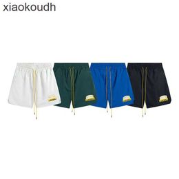 Rhude High end designer shorts for Chaopai Emblem Embroidered Lace up Casual Shorts for Men and Women High Street Beach Sports Capris With 1:1 original labels