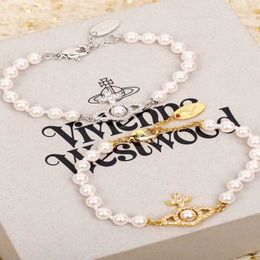 Designer Westwood Hollow Saturn Pearl Bracelet Womens French Classic Cross High Edition