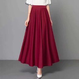 Skirts Fashionable womens long solid color long dress elegant party womens A-line elastic band Korean Maxi ski suit Q240507