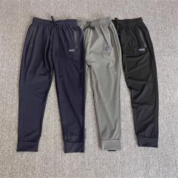 Mens Joggers Brand Casual Pants Fitness Women Sportswear Tracksuit Bottoms Skinny Sweatpants Trousers Gyms Track Pants