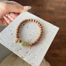 Bangle Laoshan sandalwood round bead womens natural Hotan Jade gourd original design elastic rope Wenwang simple exquisite Jewellery Q240506