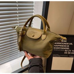 Shop Best Selling Handbag Novel 80% Factory Wholesale Large Capacity Waterproof Handheld Tote Dumpling Bag for Womens New Nylon Lightweight One Shoulder CrBagss