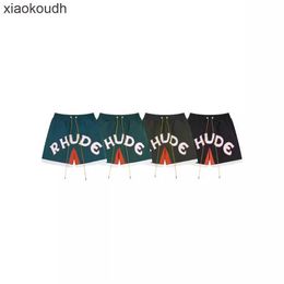 Rhude High end designer shorts for New trendy letter Colour block casual sports mesh shorts unisex beach pants With 1:1 original labels