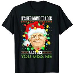 İlk başta kadın tişörtü beni özlüyormuş gibi görünüyordu. Trump Noel Tatili T-Shirt Topl2405