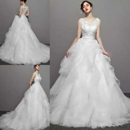 Neck bröllop 3D klänning underbar skräddarsydd juvelblommor applikationer pärlor roston design brudklänningar tiered vågdetaljer kjolar