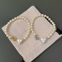 Designer Westwood Saturn Alien Love Pearl Bracelet High Version Westwoodtar Light Luxury Peach Heart Chain