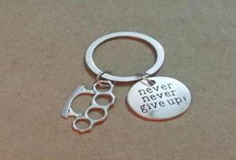 Never Give Up Brass Knuckle Dusters Metal Alloy Keychain For Keys Car Bag Key Ring Handbag Couple Key Chains Jewellery Men Gifts 7056480687