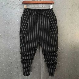 Men's Pants 2023 New Summer Korean Fashion Trend Casual High Waisted Pocket Stripe Elastic Mens Slim Fitting Leggings Cropped Pants T240507