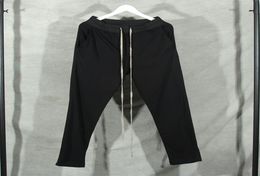 Pantaloni elastici pantaloni della tuta a colori solidi High Street Hiphop Ophop Men Women Coupes 100 Cotone Pant5984822