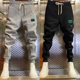 Men's Pants Men Solid Colour Loose Thick Plush Ankle-banded With Drawstring Elastic Waist Patchwork Badge Decor