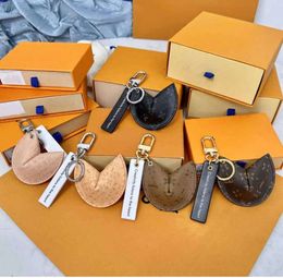 Keychains Lanyards With box Fortune Cookie Bag Hanging Car Flower Charm Jewellery Women Men Gifts Fashion PU Leather Key Chain Accessories Motion current 1100ess