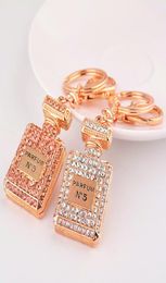 Novelty Items Full Rhinestone Perfume Bottle Design Keychains Crystal Keyrings Creative Jewellery Trinket For Women 5358782