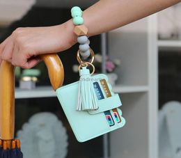 Leather Card Bag Tassel Charm Bracelets Silicone Bead Wristband Cuff Wallet Keychain for Women Children Fashion jewelry3519101