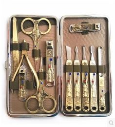 Wholesale-2015 Pedicure Manicure Russia Pattern Nail Kit With 12 Sets Of High-grade Diamond Bronze Suede Clippers Free Shipping7413684