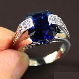 With Side Stones Top Sell Drop Luxury Jewellery 925 Sterling Sier Princess Cut Blue Sapphire Cz Diamond Gemstones Male Men Band Ri3063 D Dhtil