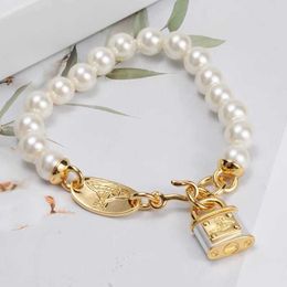 Designer New Westwood Lock Head Pearl Bracelet Womens Personality Punk Style Saturn Stereoscopic Straight Hair