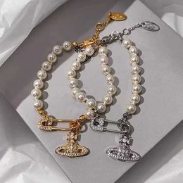 Designer Westwood Classic Full Diamond Pin Saturn Pearl Bracelet Womens Fashion Trend High Edition Accessories