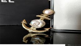 2020 warm winter new listing classic naval sailboat anchor brooch natural baroque pearl brass material retro highquality brooch f5015584