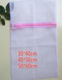 Ship 30pcs Fine Mesh 3040cm 4050cm 5060cm Bra Clothes Laundry bag Washing bag Machine Nylon Net Mesh Hosiery Lingerie Zipp7032378