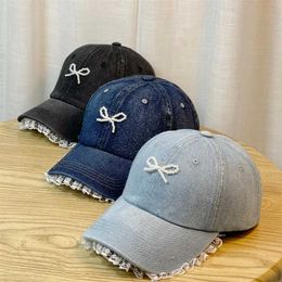 Ball Caps Bow bow cap woman 2024 new spring and summer Korean version of ins washed cowboy sunscreen baseball cap T240508