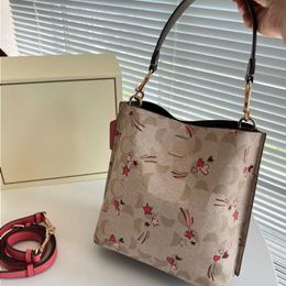 10a moda c-letter el çantaları kova tasarımcısı alışveriş çantası tote baskı crossbody vücut çiçek çapraz çanta çanta omuz çantaları deri lüks pmcd