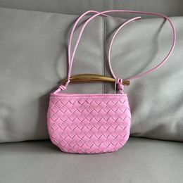 Stores are 85% off 2024 Spring New Woven Cowhide Womens Bag Handle One Shoulder Crossbody Handbag908Z