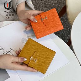 Genuine leather women's short 2024 new niche design exquisite high-end multifunctional driver's license card bag zero wallet clip 80% factory wholesale
