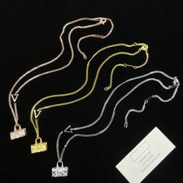 Модные подвесные ожерелья для женского ожерелья дизайнерские ювелирные сумки камень v-образные подвески качественные подвесные подвески простая и модная бесплатная доставка